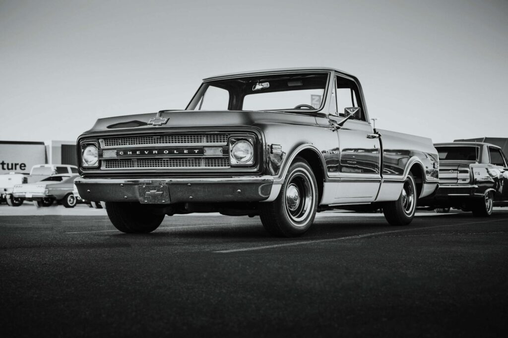 A busy Las Vegas street showing parked cars and a towing truck. — towing companies Las Vegas