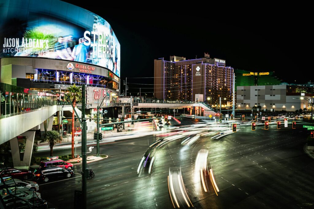 A busy Las Vegas street with various vehicles needing towing during peak season. — best time for towing Las Vegas
