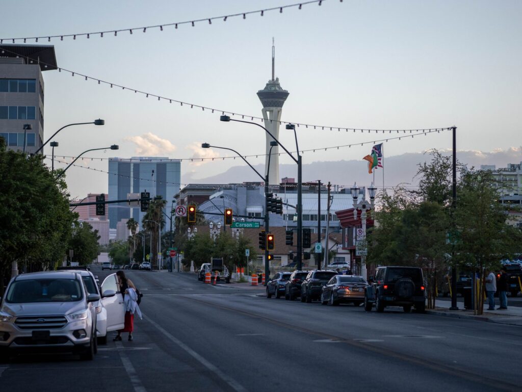 A car pulled over on the side of the road with hazard lights on in Las Vegas. — car breakdown las vegas