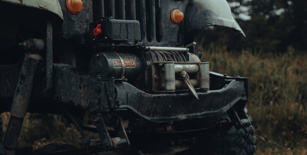 A close-up of a vehicle being towed, highlighting the towing equipment. — emergency towing Las Vegas