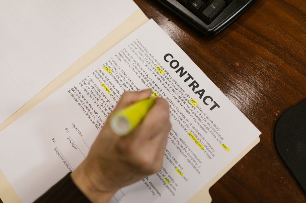 A photo of a consumer reviewing a towing contract with highlighted sections. — hidden costs towing Las Vegas