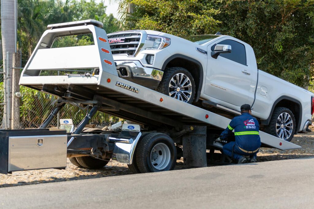 A photo of a tow truck in action, illustrating emergency towing services. — average towing cost Las Vegas