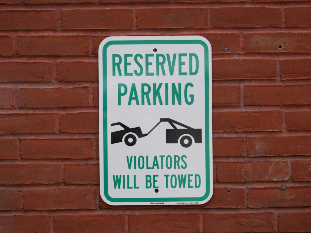 An image of a roadside assistance sign that includes towing services — cost of towing Las Vegas