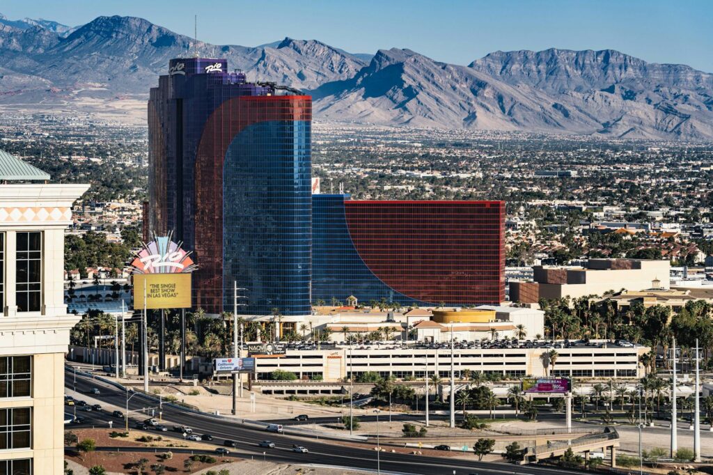 Image showing a tow truck in Las Vegas with city skyline — choose cheap towing service Las Vegas
