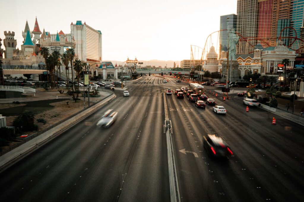 A Las Vegas highway with cars in stop-and-go traffic under the sun. — car overheating las vegas