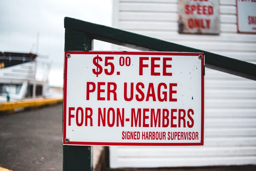 A close-up of a notice indicating impound fees displayed at the lot. — las vegas impound lot