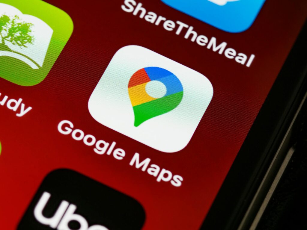 A close-up of a smartphone displaying a towing service app. — emergency towing Las Vegas