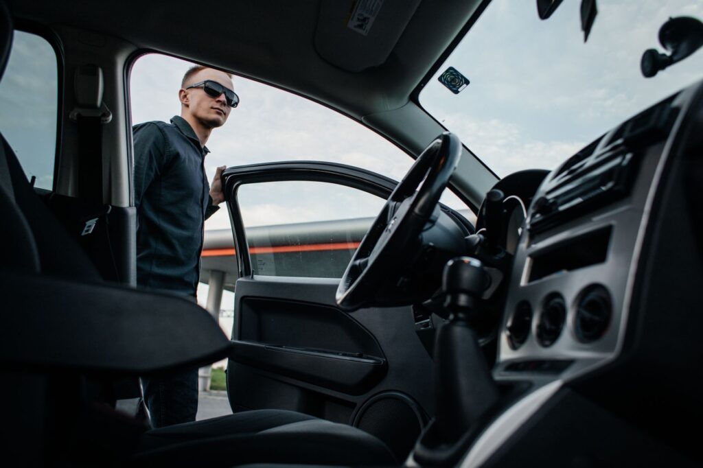 A driver safely exiting a vehicle after a breakdown. — car breakdown Las Vegas towing