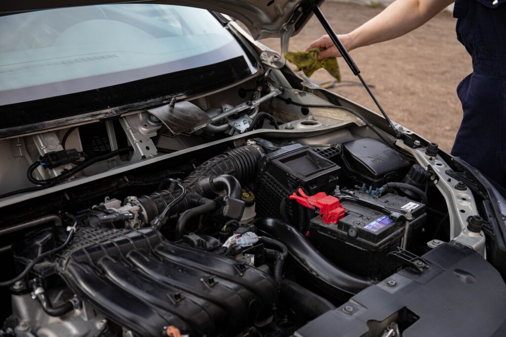 Image of a car with hood open, showing a dead battery in Las Vegas. — dead battery las vegas