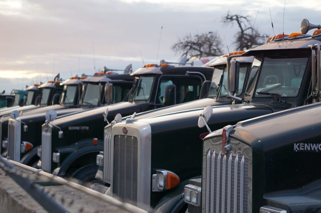 A fleet of trucks lined up ready for towing services — heavy duty towing las vegas