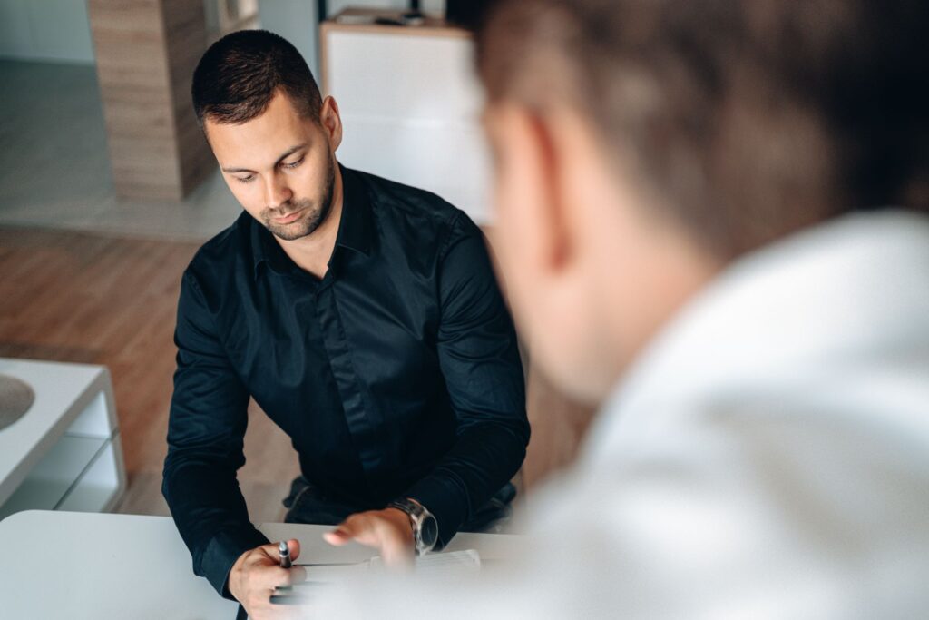 A person negotiating with a towing company representative — negotiate towing fees las vegas