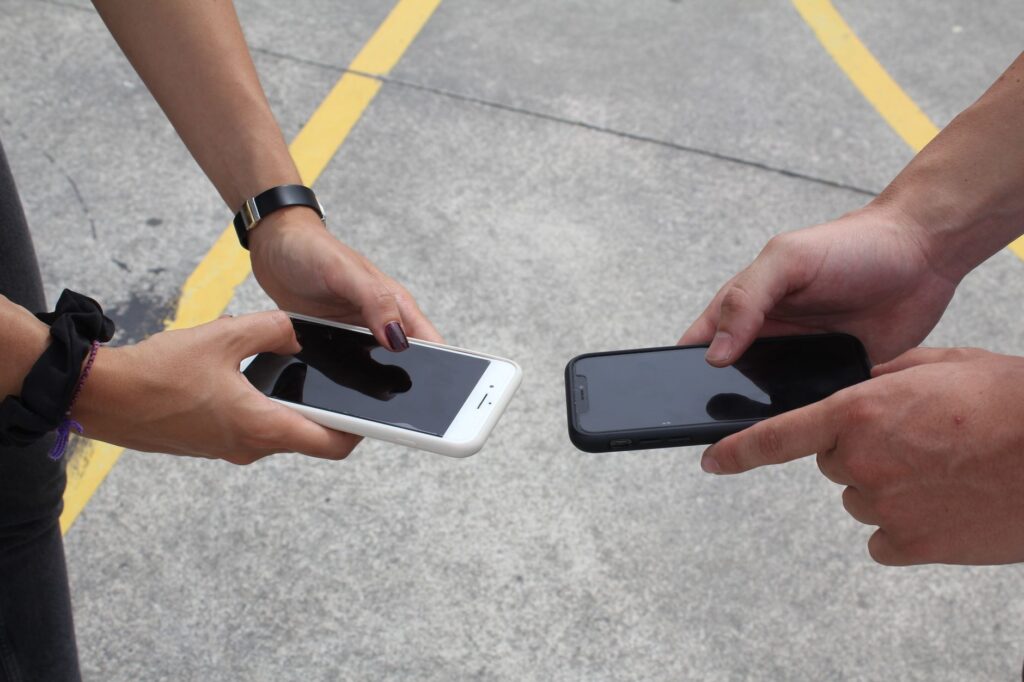 Image of a person comparing towing rates on a smartphone — best time cheap towing Las Vegas